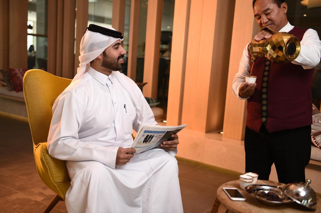 Sealine Beach, A Murwab Resort Mesaieed Extérieur photo A Qatari man wearing the dishda'a