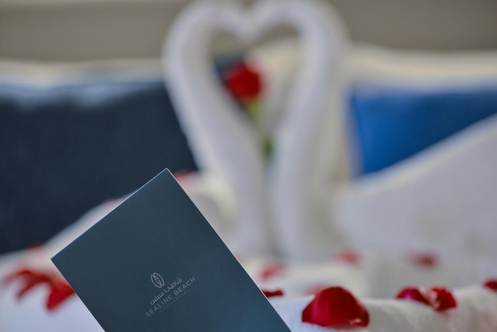 Sealine Beach, A Murwab Resort Mesaieed Extérieur photo A menu at the Waldorf Astoria Ras Al Khaimah